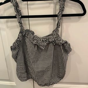 Ruffled black and white plaid tank top